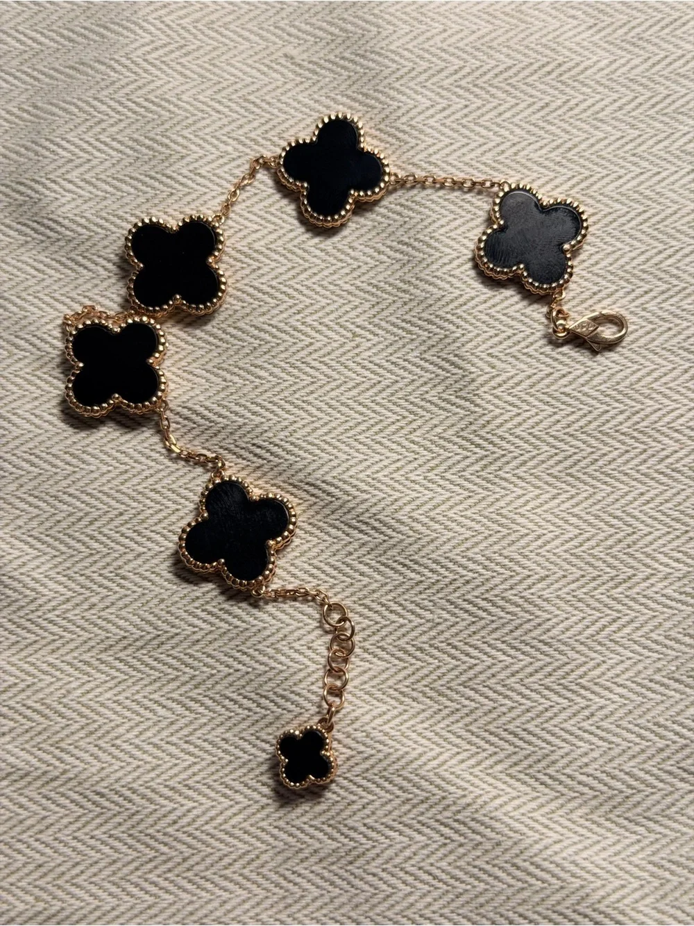 Van Cleef & Arpels Gold Bracelet with Black Alhambra Motifs